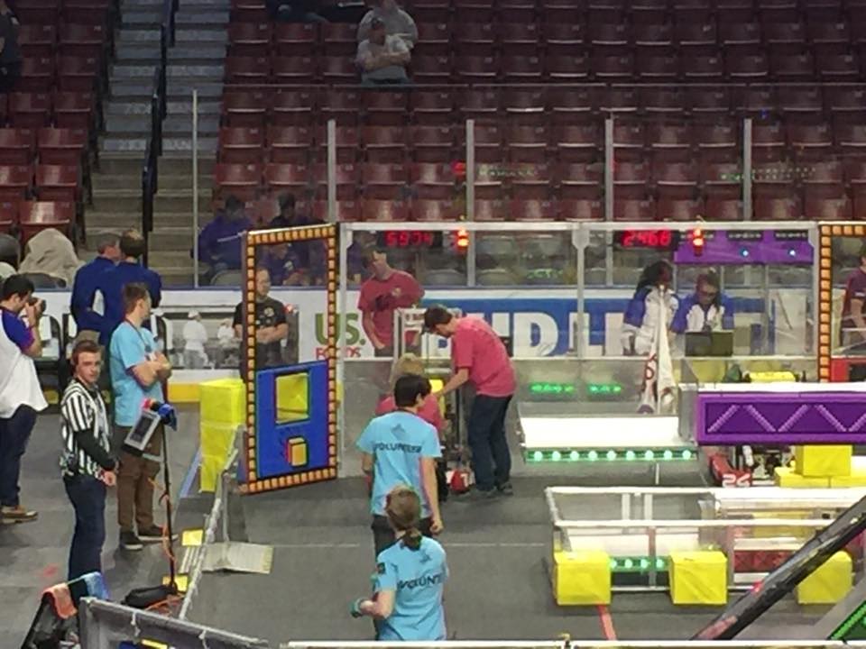 A picture of the 2018 robot being loaded onto the field